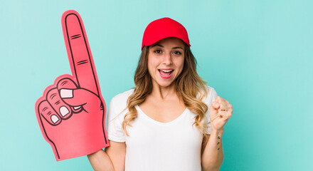 pretty woman feeling shocked,laughing and celebrating success