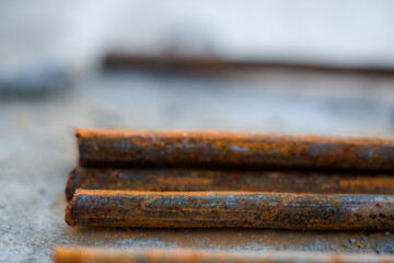 armature rusty rods for building a house in a house under construction