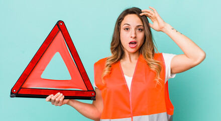 pretty woman looking happy, astonished and surprised