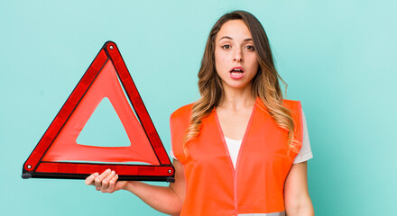 pretty woman looking very shocked or surprised