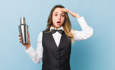 pretty woman looking happy, astonished and surprised