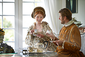 Tea with the Count. A king and queen taking tea together at home. © Yuri Arcurs/peopleimages.com
