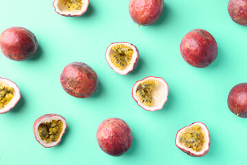Passion fruit on pastel color background, Tropical fruit in summer season, Flat lay