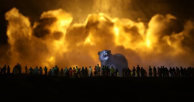 Creative artwork decoration - Russian war in Ukraine concept. Crowd looking on giant explosion and attacking giant bear. Selective focus