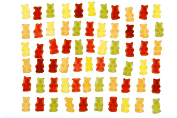Jelly bears candy isolated on a white background.Jelly low calorie sweets. Children's dessert.Jelly colored bears set.Sweet pattern in yellow and red colors.