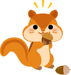 頬袋にどんぐりを入れるリス