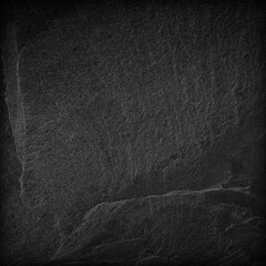 Dark grey black slate background or texture.