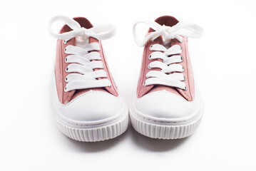 children's pink sneakers on white