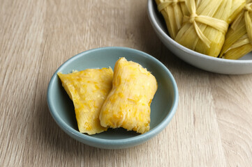 Lepet Jagung is a traditional Indonesian snack that is often found in Central Java, Indonesia, made from corn and grated coconut and wrapped in corn husks and steamed.
