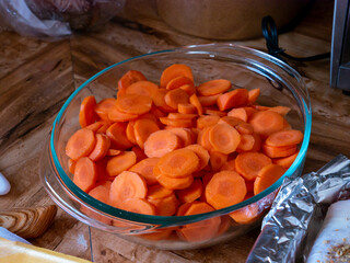 Sliced carrots in glass bowl