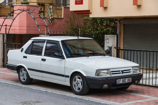 Side, Turkey -February  20, 2022:   white   Tofas  Dogan  is parked  on the street on a warm  day