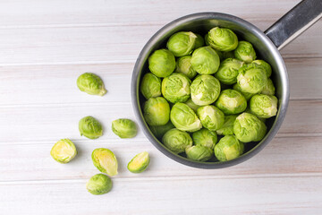 Brussels sprouts in metal bowl