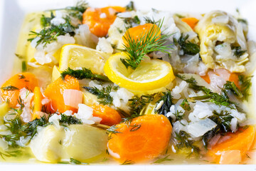 A dish with olive oil from Turkish Aegean cuisine; artichoke dish with rice and olive oil (Turkish name; zeytinyagli enginar)