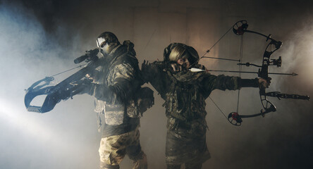 Naklejka premium apocalypse fighters. a girl with a bow and a guy with a crossbow.