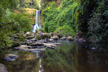 waterfall of dañicalqui estuary in the region of Ñuble, Chile, 
this waterfall is in a forest and...