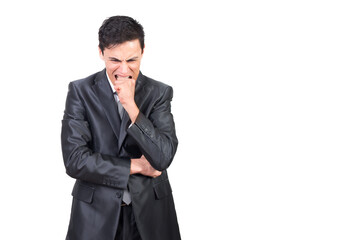 Excited man biting hand while expressing nervous state