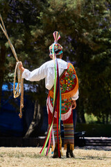 Obraz premium Close up of a papantla flyer with his typical costume, Mexican tradition