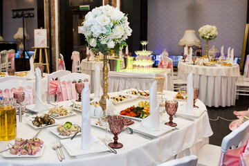 Luxury restaurant with food. An exquisite reception of guests at a banquet.