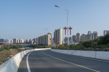 A city road in the front leads to the distance