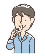 口にテープを貼っている男性