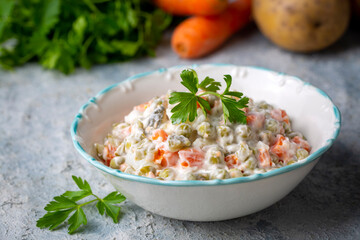 Russian salad Olivier with mayonnaise and egg served (Turkish name; Rus salatasi) - obrazy, fototapety, plakaty