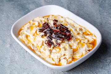 Traditional Turkish and Greek Meze with chili peppers. Turkish Appetizer Atom with yogurt. Turkish atom meze