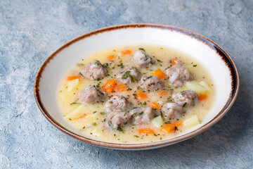 Seasoned soup with meatballs with vegetables. Turkish name; sulu kofte, eksili kofte, terbiyeli kofte)