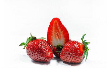 Composition of fresh strawberries on a white background.