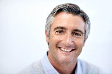 He always brings his A-game to work. Portrait of a mature businessman in his office.