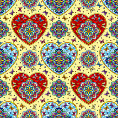 Seamless pattern with hearts, butterflies and flowers on a yellow background