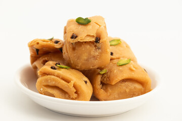 Indian Bengali Mithai Laung Latta Also Called Lavang Lata Long Latika Made Of Cloves Ghee And Stuffed With Mawa Khoya Chasni Mava Khoa Is Enjoyed On Deepawali, Teez, Rakhi Holi, Rakshabandhan And Teej