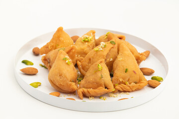Samosa Gujia Mithai Also Called Gujiya, Pirukiya, Pirukia, Pedakiya, Karanji, Basundi Gughra Made Of Suji Ghee Stuffed With Mawa Khoya Chasni Mava Khoa Is Enjoyed On Deepawali, Teez, Holi And Teej