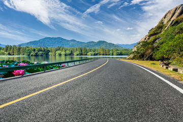 Empty asphalt road and mountain with river natural landscape