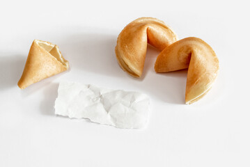 Fortune cookies with blank paper slip on white background, mockup