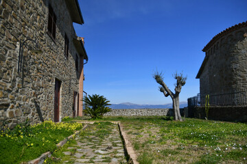 The lawn in front of an old house in Rocca Cilento, a medieval village in the province of Salerno,...