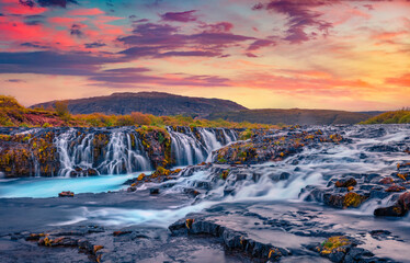 Attractive summer view of Bruarfoss Waterfall. Picturesque sunset in Iceland, Europe. Beauty of nature concept background.