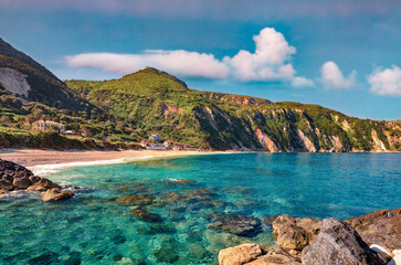 Obraz premium Tranquil summer view of Petani Beach. Amazing morning scene of Cephalonia Island, Greece, Europe. Attractive seascape of Mediterranen Sea. Wonderful outdoor scene of Ionian Islands.