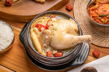 Ginseng chicken soup or Samgyetang, Koreans traditional food chicken stuffed with rice, ginsenga popular stamina food in summer.