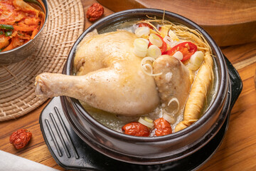 Ginseng chicken soup or Samgyetang, Koreans traditional food chicken stuffed with rice, ginsenga popular stamina food in summer.