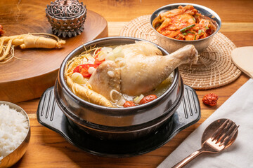 Ginseng chicken soup or Samgyetang, Koreans traditional food chicken stuffed with rice, ginsenga...