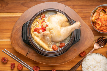 Ginseng chicken soup or Samgyetang, Koreans traditional food chicken stuffed with rice, ginsenga popular stamina food in summer.