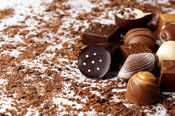 Various chocolate praline candies assortment close up