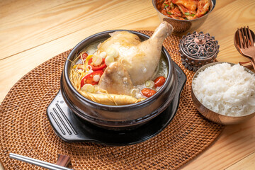 Ginseng chicken soup or Samgyetang, Koreans traditional food chicken stuffed with rice, ginsenga...