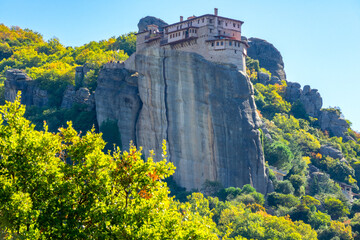 Greek Rock Monastery on a Green Mountain Slope