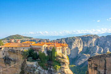 Fototapeta na wymiar Greek Rock Monastery and Clouds on the Horizon
