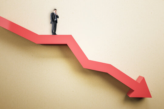 Businessman standing on abstract red downward chart arrow on light background. Down, drop, finance and crisis concept. Mock up place.