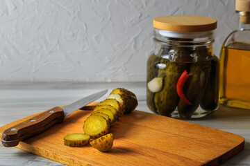 Pickled cucumbers in a jar.