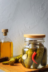 Pickled cucumbers in a jar.