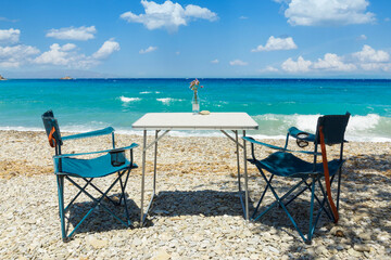 table and chair by the sea