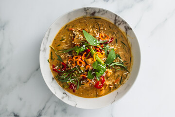 vegan thai vegetable curry with fresh chili and herbs, healthy plant-based food